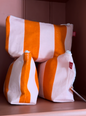 Necessär randig orange/rosa